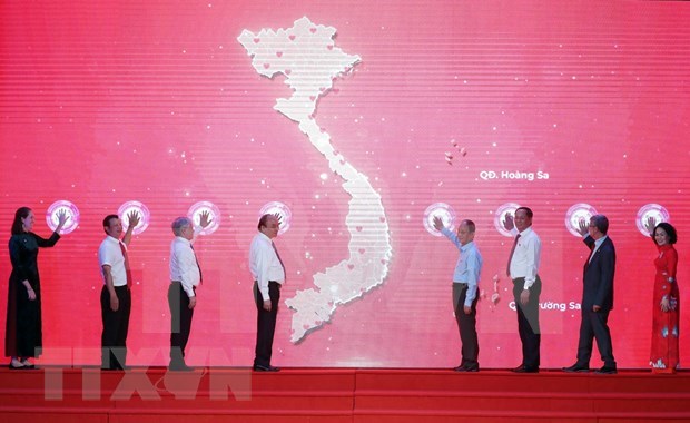 Voluntary, charity work common responsibility of society President
